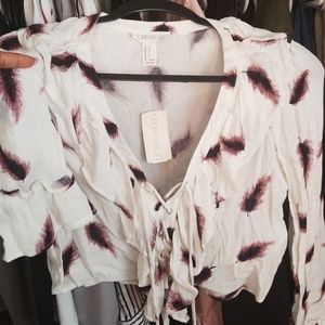 Brand new. Cute crop top.